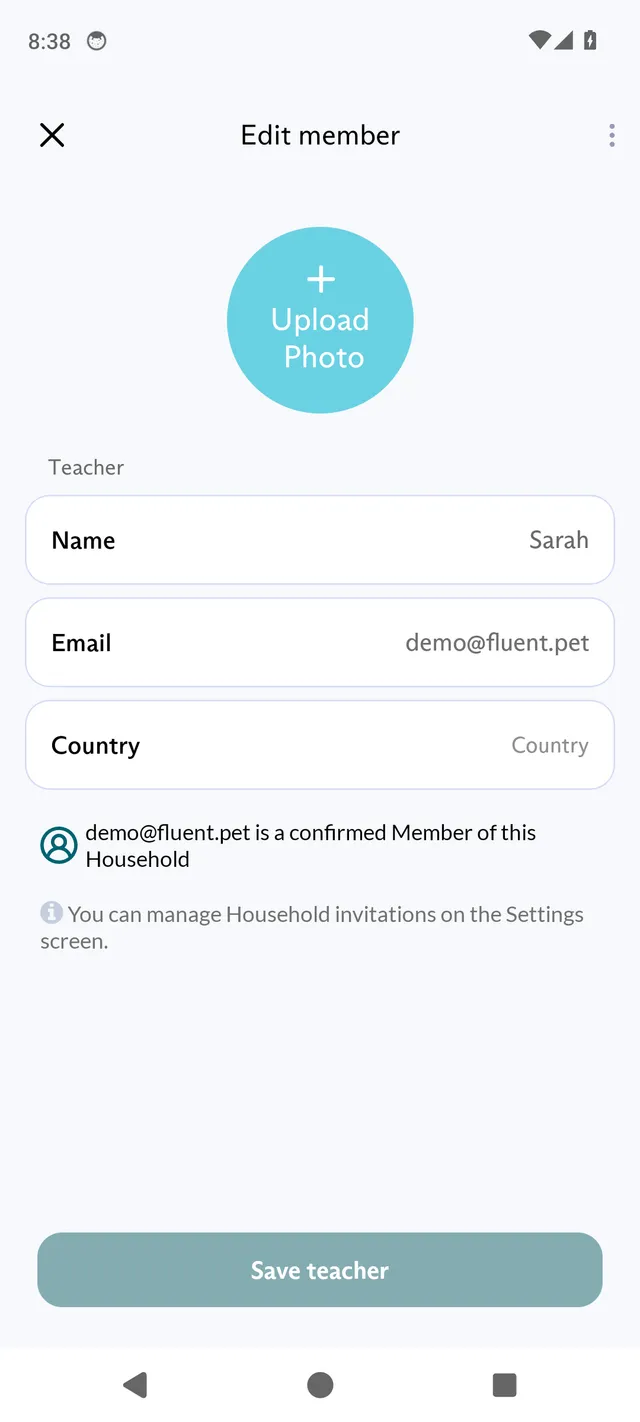 The Edit member screen in the FluentPet app for a teacher, with the Upload Photo, Name, Email and Country fields and the Save teacher button.